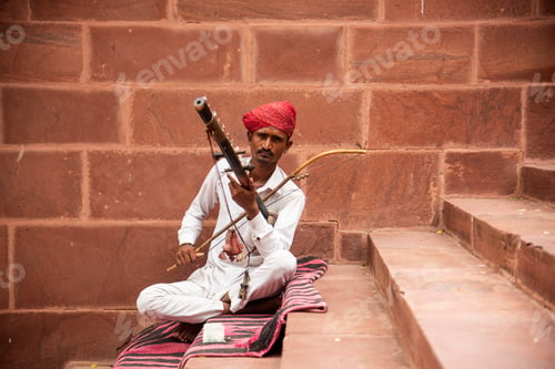 Preview: Street musician playing music instrument