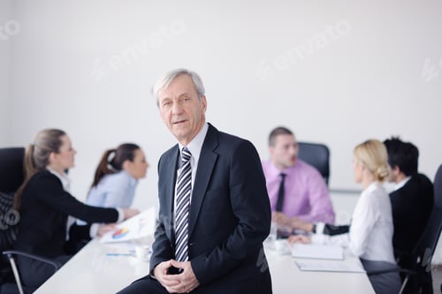 Preview: Business People Team At A Meeting In A Light And Modern Office Environment.