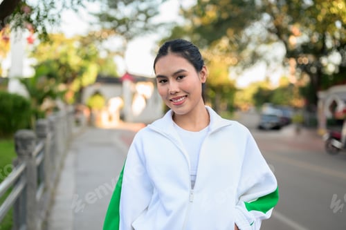 Preview: Young Asian Woman in Sporty Casual Outfit Outdoors