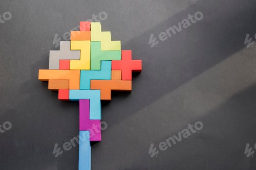 Preview: human brain wooden blocks on black background. human Geometric shapes in different colors