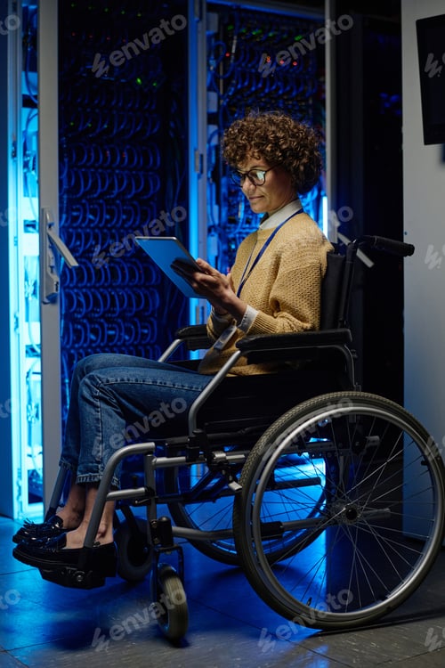 Preview: System admin with disability working in server room