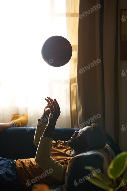 Preview: Relaxing at Home Playing with Basketball While Lounging