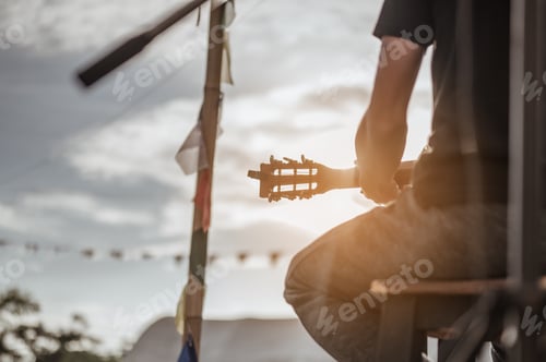Preview: Musicians checking and tuning strings before the music festival.Concert,mini concert