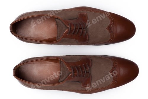 Preview: Classic male leather shoes isolated on a white, top view