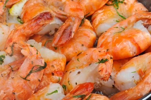 Preview: Cooking shrimp on a pan. Close up view.