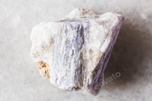 Preview: sample of raw rubellite crystal in rock on white