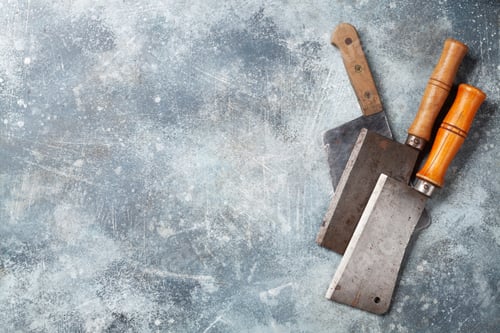Preview: Butcher. Vintage meat knives over stone table