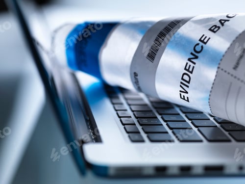 Preview: Close up of laptop computer ready to take away in forensic evidence bag
