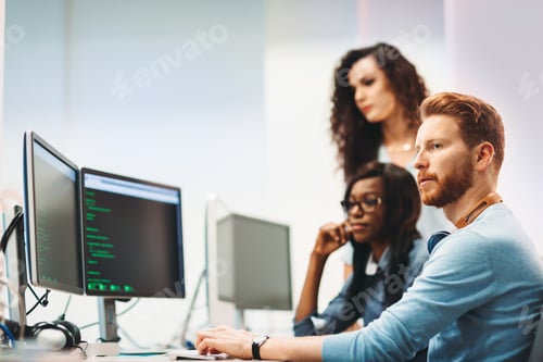 Preview: Software engineers working on project and programming in company
