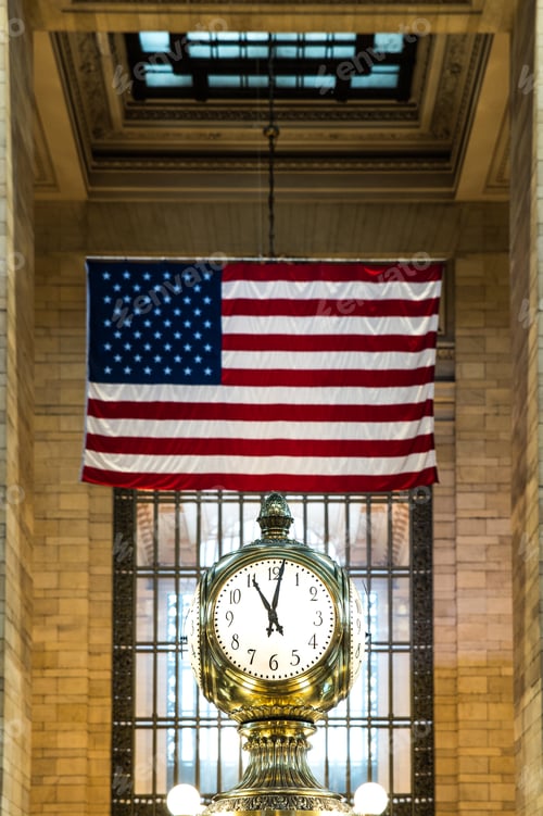 Preview: Vintage clock at railway station with USA flag