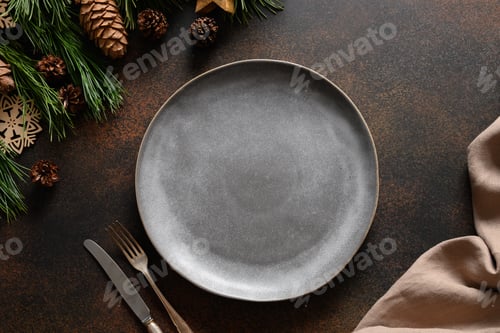 Preview: Christmas cozy table setting with grey plate on brown.