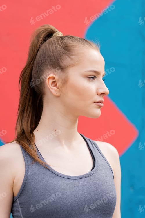 Preview: Woman in Athletic Wear Posing Outdoors