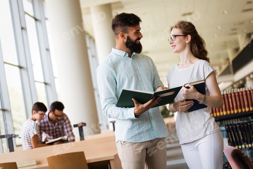 Preview: People studying together in a modern library