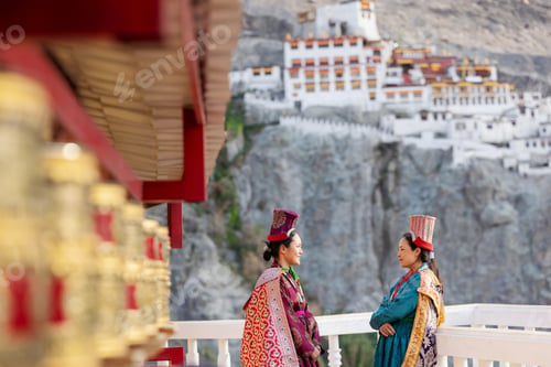 Preview: Two women dressed in traditional Leh attire