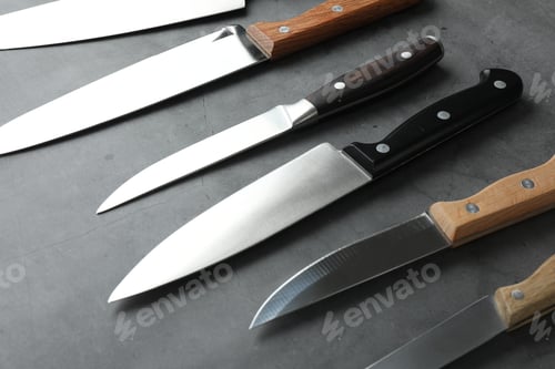 Preview: Many different knives on grey textured table