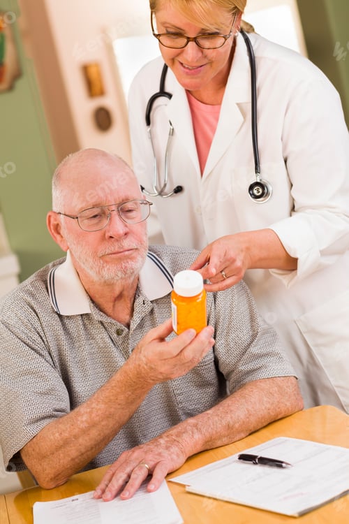 Preview: Senior Man Receives Medication from a Healthcare Professional