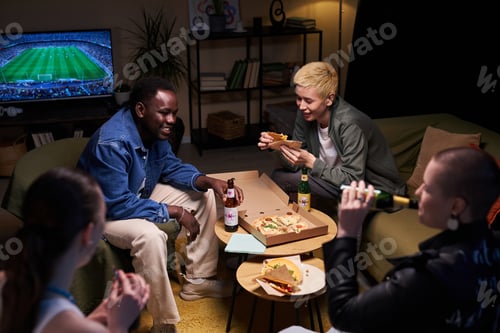 Preview: Cheerful Young People Having Fun at Home Party