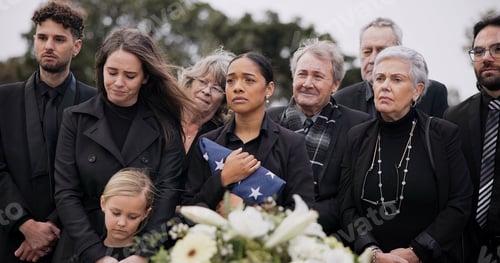 Preview: Funeral, cemetery and family with American flag for veteran for respect, ceremony and memorial serv