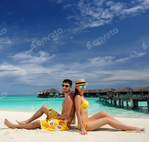 Preview: Couple On A Tropical Beach At Maldives