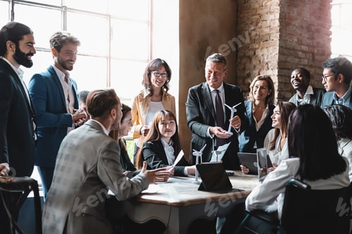 Preview: meeting of colleagues gathered around the table