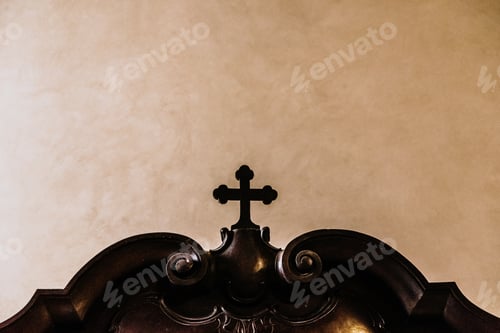 Preview: Christian cross made of wood with flat background.