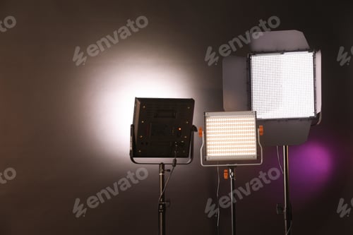 Preview: Professional lighting equipment on dark background with color lights