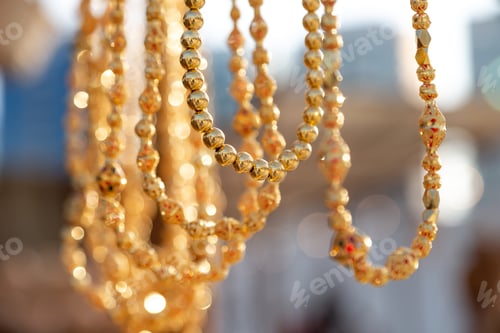 Preview: Golden necklace at the traditional Arabic market in Abu Dhabi, closeup