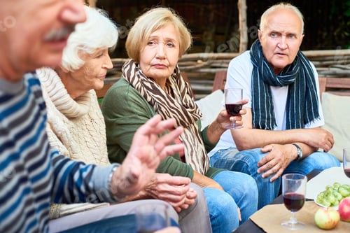 Preview: Senior Adults Enjoying Wine and Conversation Together