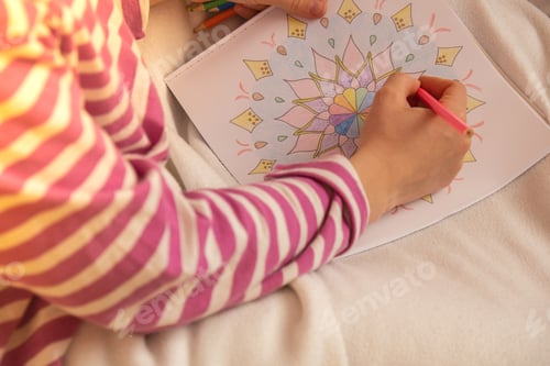 Preview: Female painting mandalas antistress page to combat stress. Relaxing hobby mental wellbeing and art