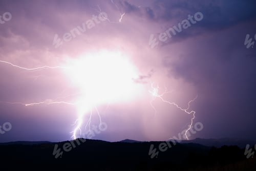 Preview: Lightning strike on the dark cloudy sky