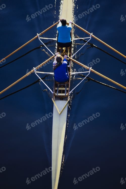 Preview: Overhead view of women rowing double scull boat during competitive race in Seattle.