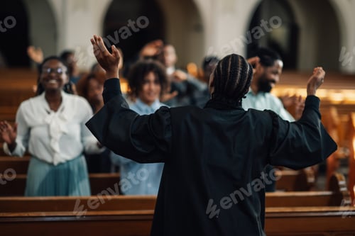 Preview: Preacher leading congregation in prayer inside church