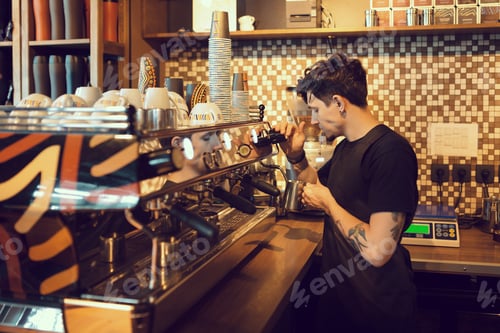 Preview: Barista at work in a coffee shop