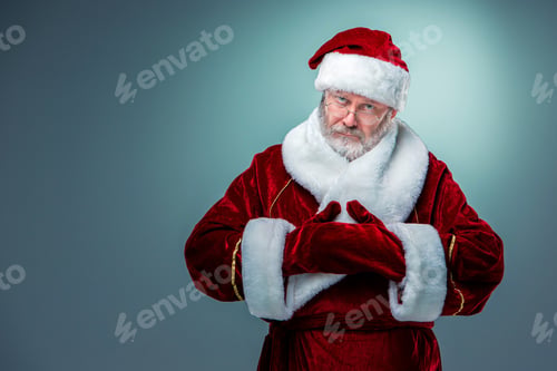 Preview: Serious Santa Claus, Presenting Something On A Blue Background