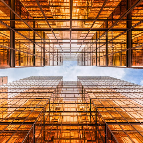 Preview: Uprisen angle of Hong Kong skyscraper with reflection of clouds among high building