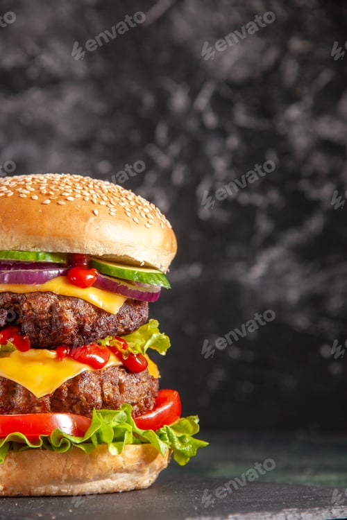 Preview: Vertical of delicious meat sandwich with tomatoes green on dark color tray on black background
