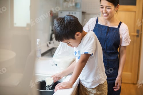 Preview: Family home. A mother and son standing at a sink.