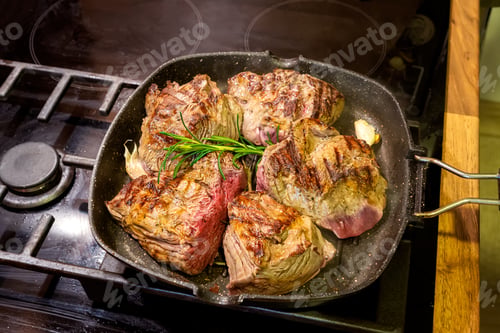 Preview: Veal steak with spices in a grill pan