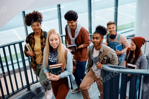 Preview: Multiracial group of college students going to a lecture together.