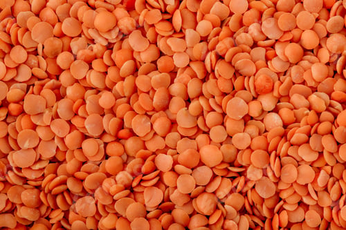 Preview: Lentils. Red dry uncooked lentils background.