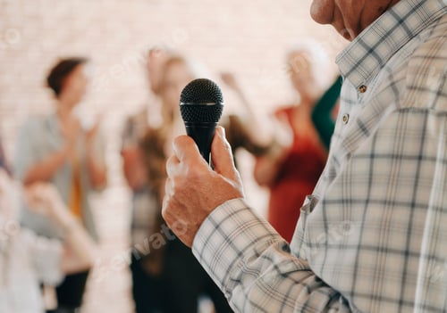 Preview: Senior man talking in a seminar