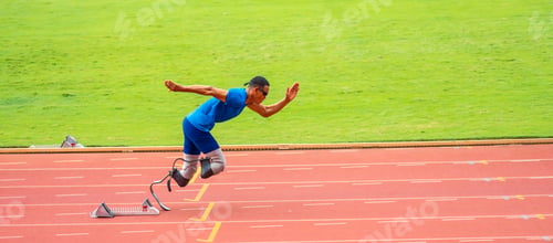 Preview: Asian para-athletes disabled with prosthetic blades running at stadium.