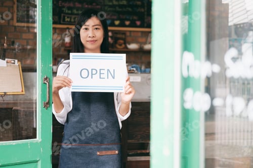 Preview: Small business: Happy owner of a cafe. Young startup owner small cafe shop.