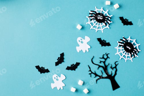 Preview: Composition of pumpkin with spooky face delicious candies, decorative elements