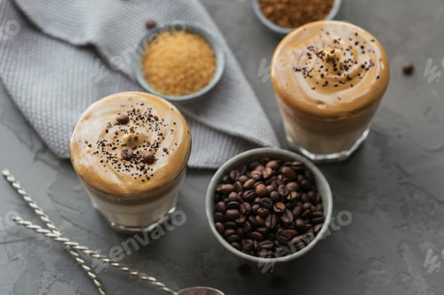 Preview: Glass of Iced Dalgona Coffee, trendy fluffy creamy whipped coffee and milk