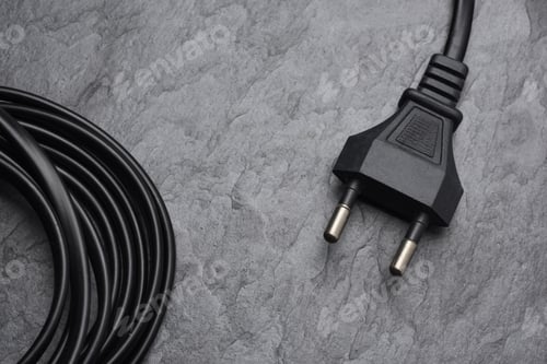 Preview: AC power plug type C on black slate background