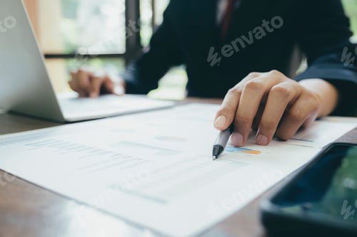 Preview: Business working with charts in an office