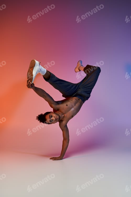Preview: A dancers graceful move against a colorful background