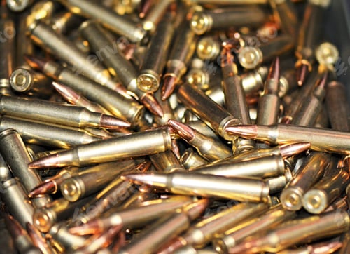Preview: Closeup of a pile of golden rifle ammunition