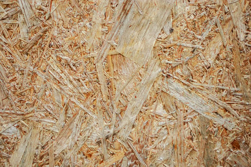 Preview: Pressed shavings. Wooden texture OSB Board. Building material for renovation.